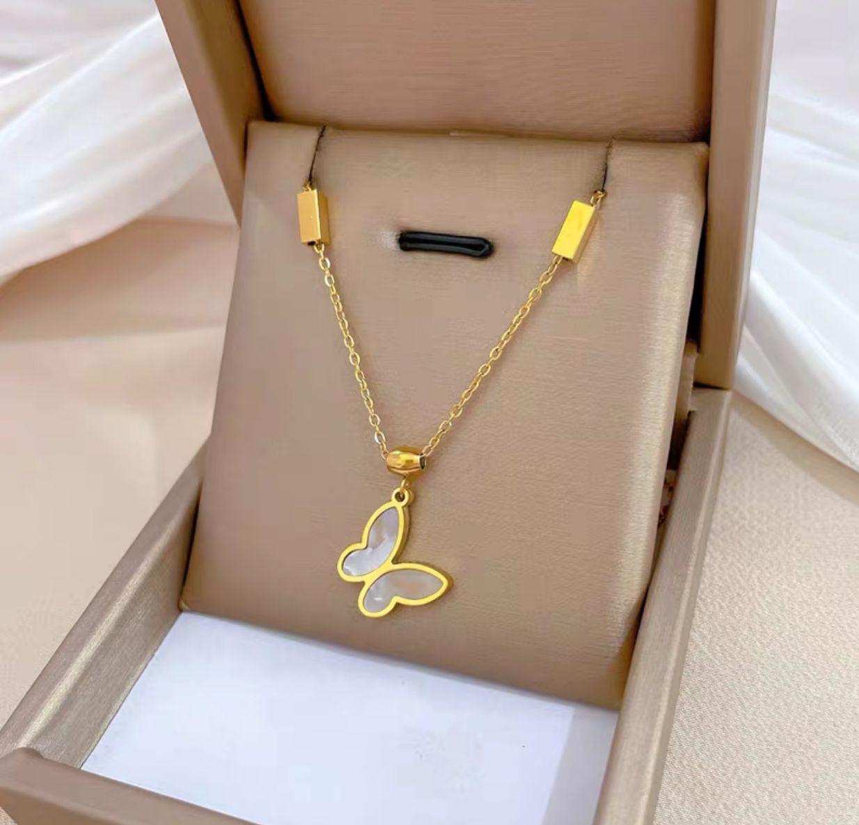 Golden Whisper Butterfly Pendant